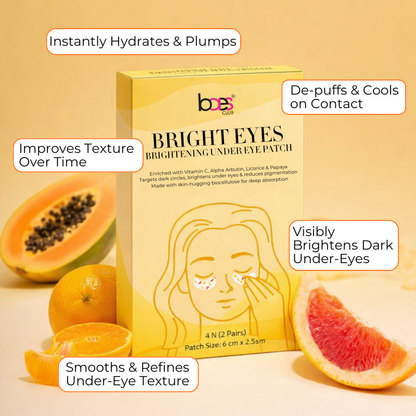 Box of Bright Eyes Brightening Under Eye Patch with papaya and orange slices on a beige background